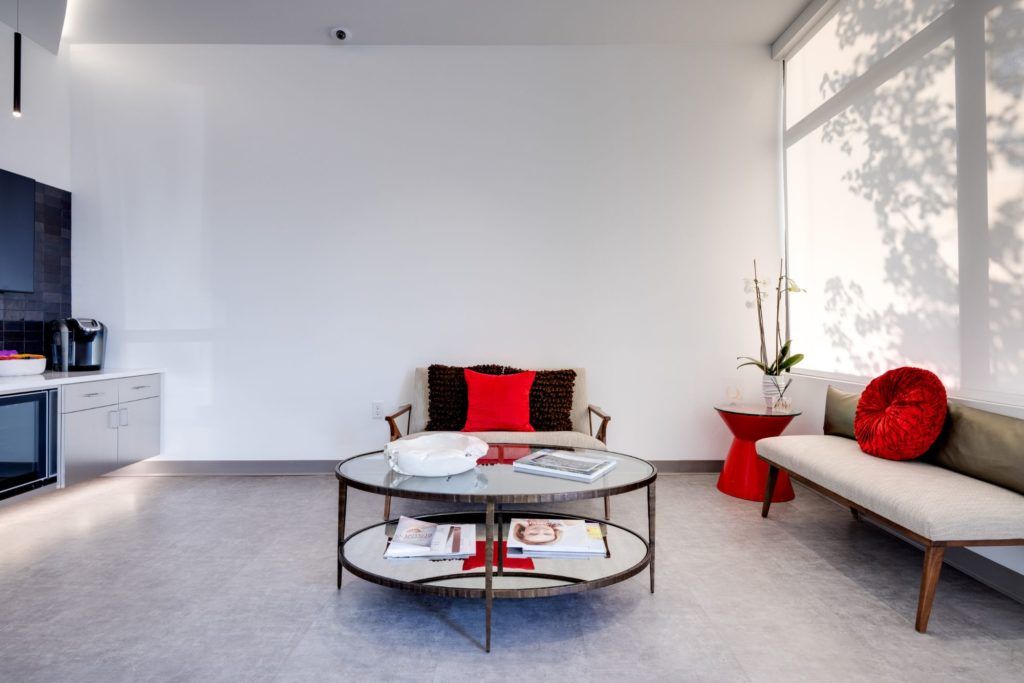 Modern living room with stylish decor and furniture.