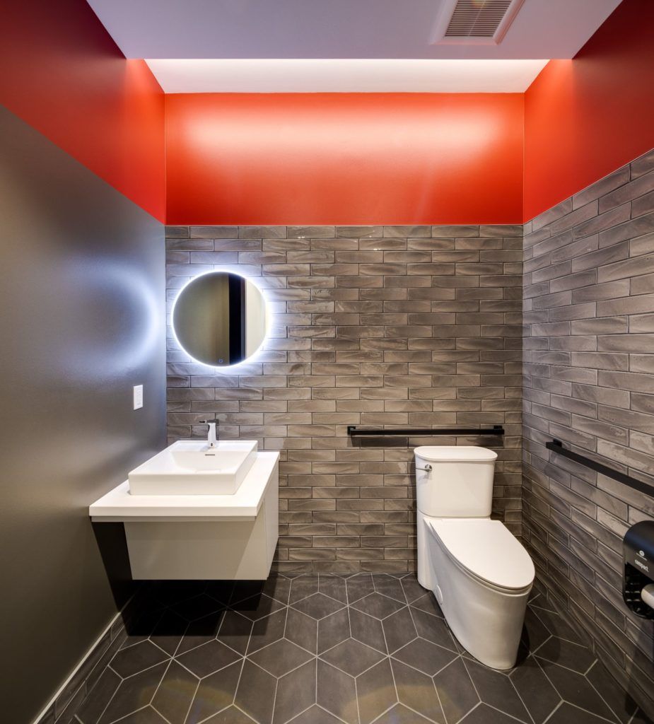 Modern bathroom with sleek design and amenities.