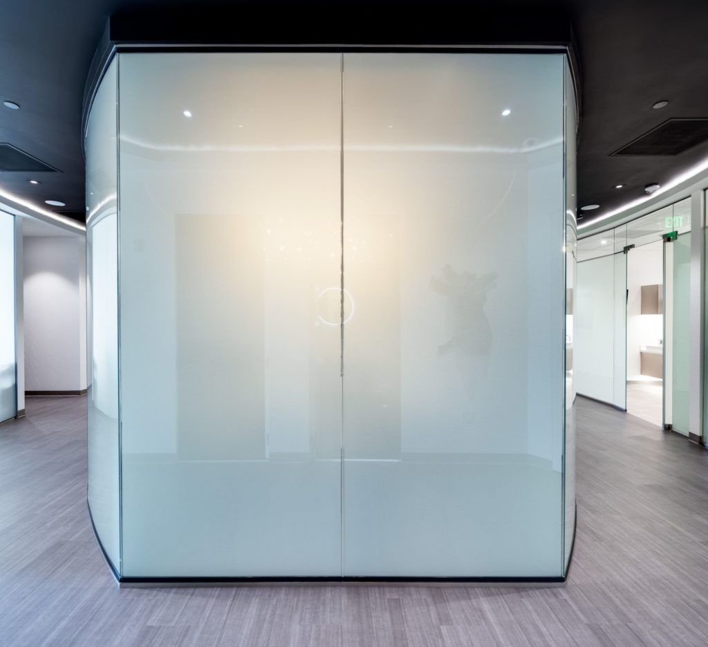 Modern glass wall in contemporary interior space.