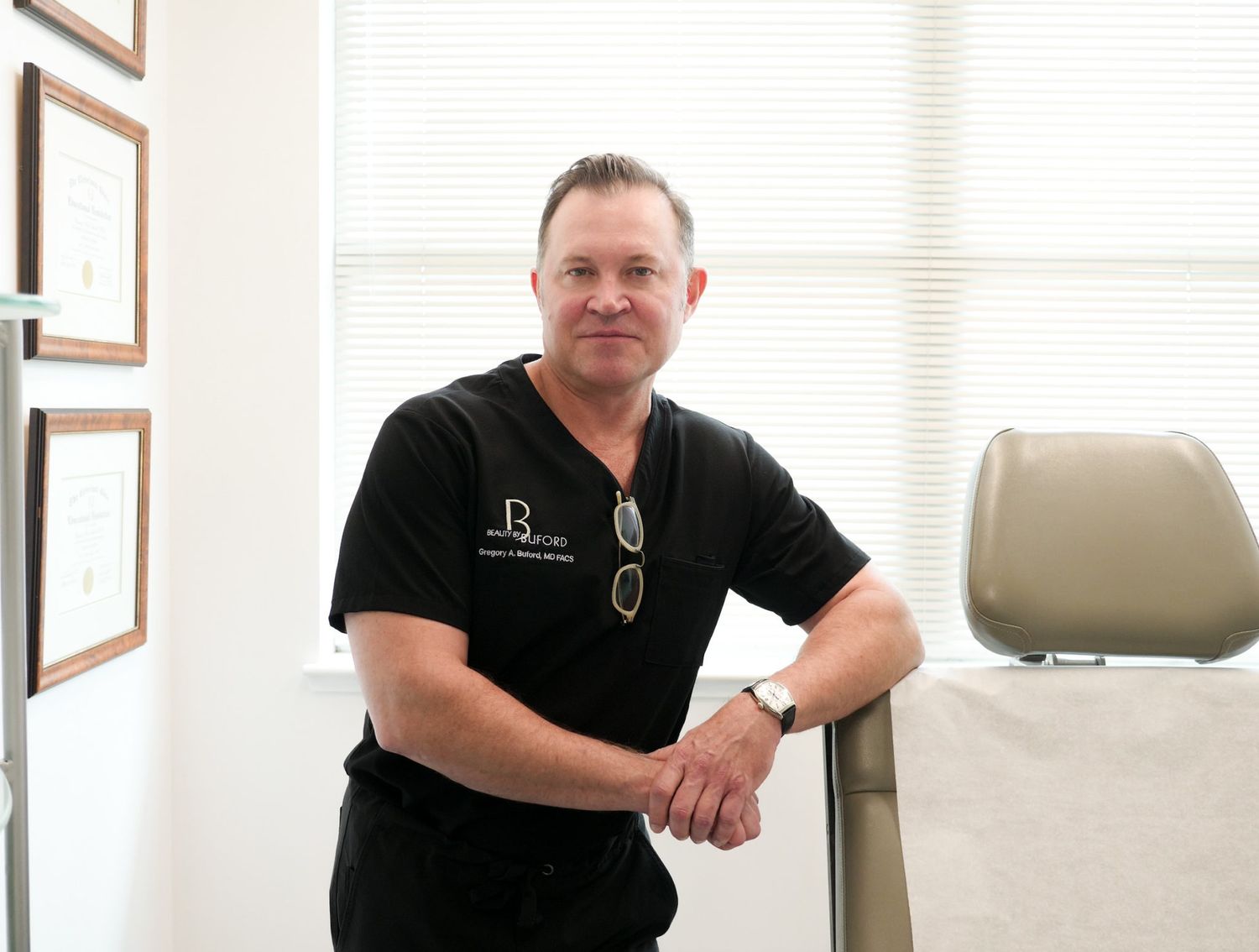 Doctor posing in a medical office setting.