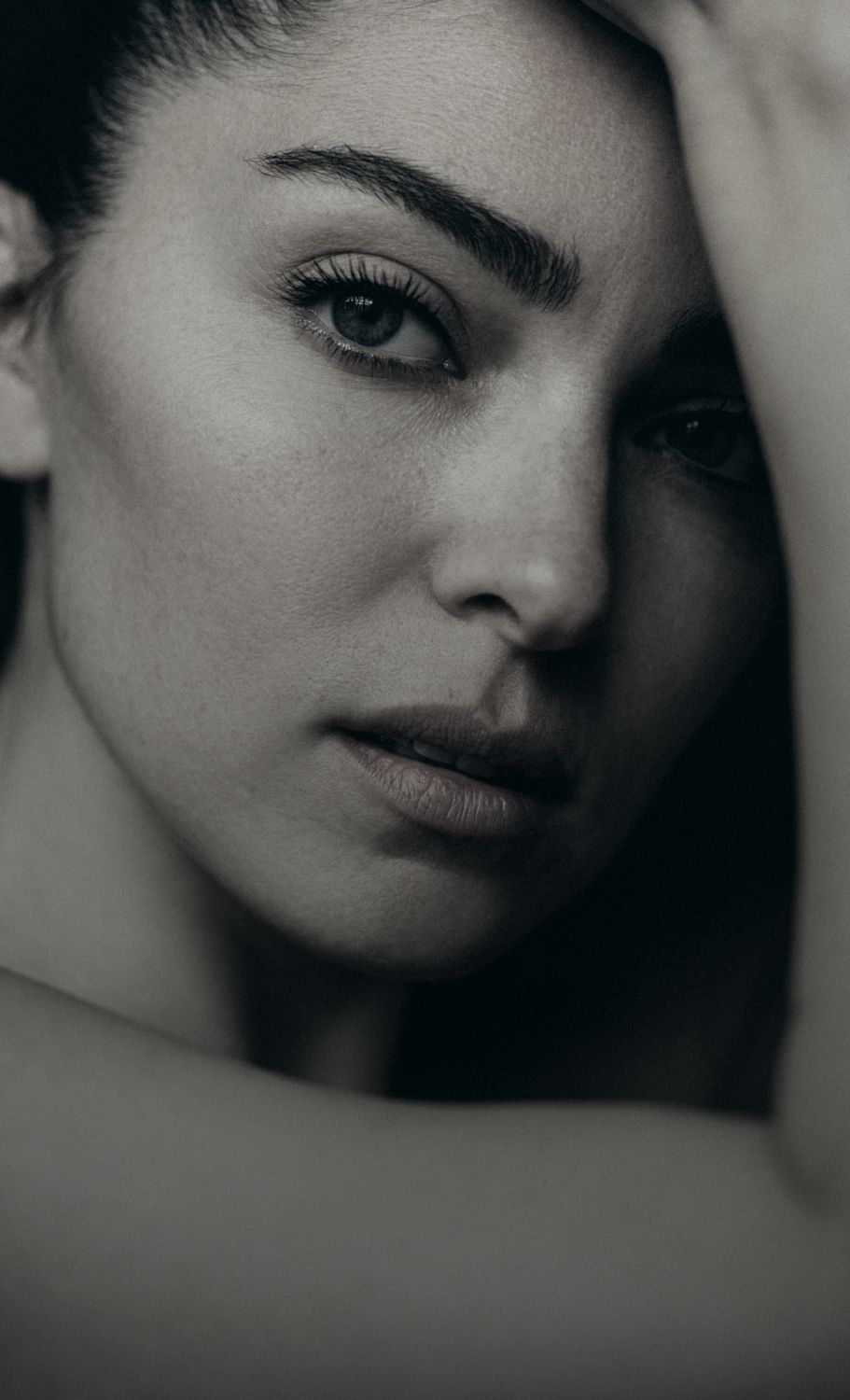 Close-up portrait of a Denver plastic surgery model in monochrome.