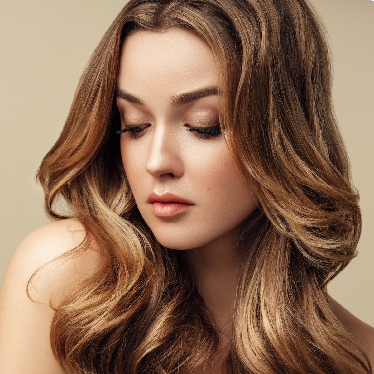 Denver med spa model with flowing hair.